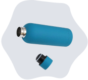 A blue bottle with a black cap next to a blue tube.